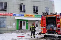 В Волгограде МЧС опубликовало фото и видео с места тушения магазина на Ангарском
