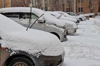 В Волгограде ликвидируют последствия снегопада: фото с заснеженных улиц