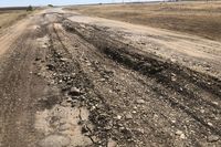 Под Волгоградом дорогу с перепаханным асфальтом отремонтируют по решению суда