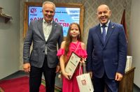 Радость слышать: нефтяники вручили детям средства реабилитации слуха
