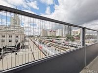 Сетка вместо пластика: на Комсомольском мосту появились «дышащие» экраны