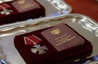 Под Волгоградом семьям тринадцати погибших бойцов передали награды